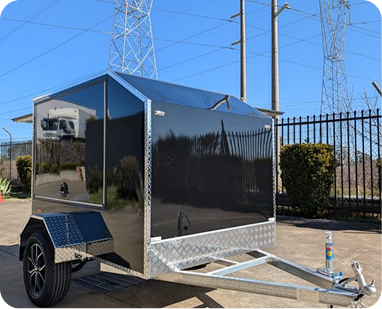 Enclosed luggage trailer
